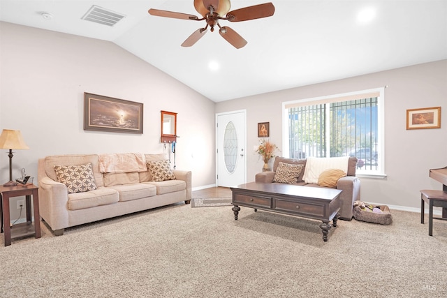 carpeted living room featuring ceiling fan and lofted ceiling