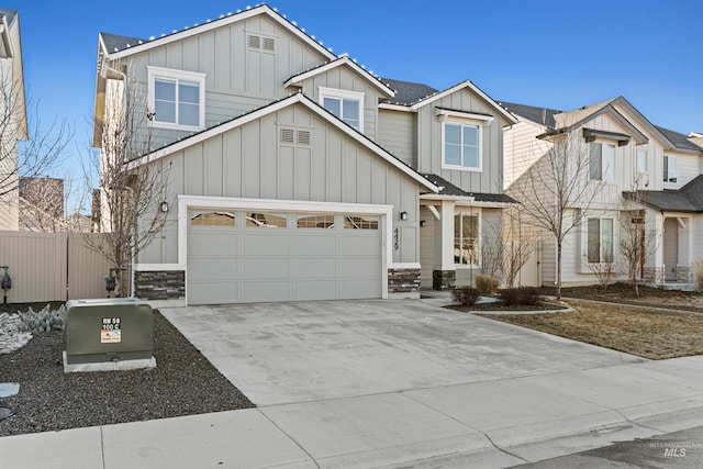 craftsman inspired home with a garage