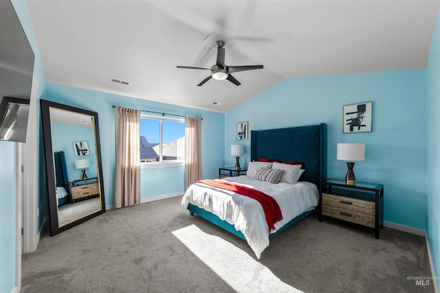 bedroom featuring vaulted ceiling, carpet, and ceiling fan