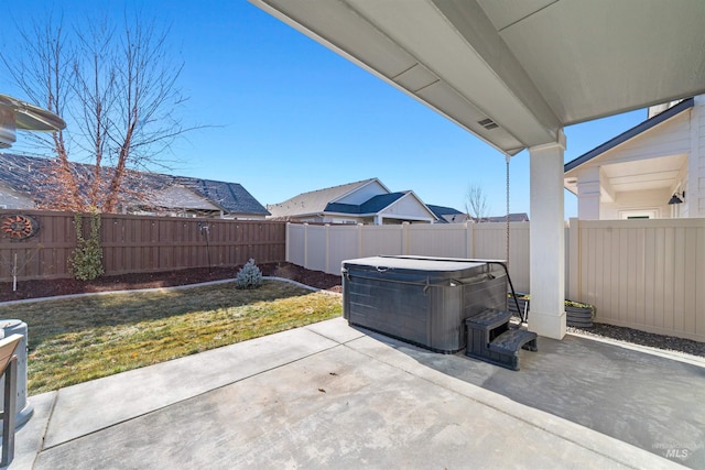 view of patio featuring a hot tub