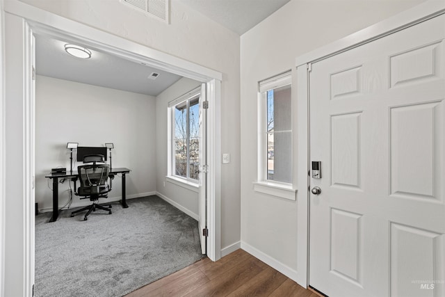 office space with hardwood / wood-style floors