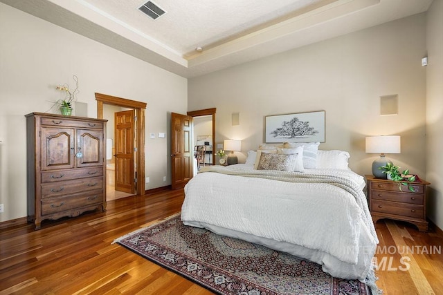 4553 N Arrow Crest Way, Boise, ID 83703 - bedroom featuring wood finished floors and baseboards