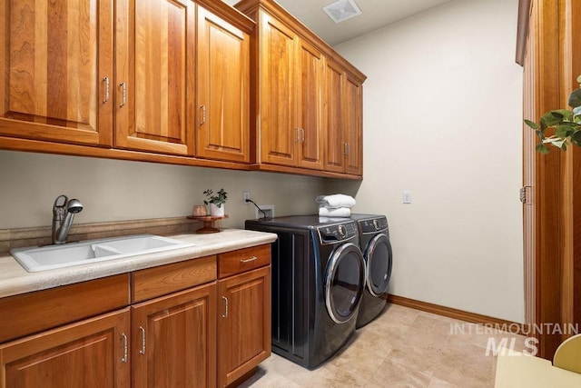 4553 N Arrow Crest Way, Boise, ID 83703 - laundry area with cabinet space, independent washer and dryer, and baseboards
