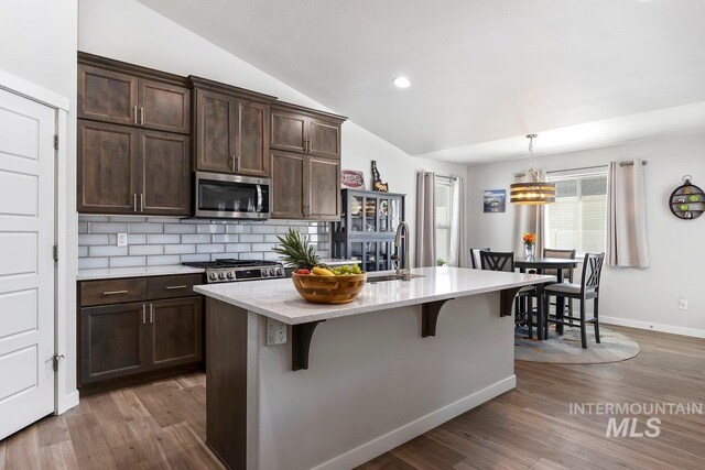 dining room with hardwood / wood-style flooring