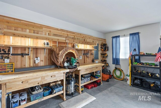 garage featuring a garage door opener and white fridge