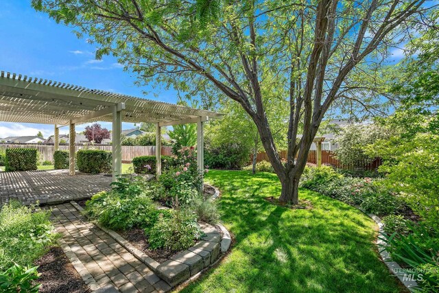 613 E Sable Ridge Dr, Kuna, ID 83634 - view of yard featuring a pergola