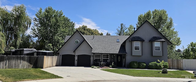 1122 N Roper Pl, Meridian, ID 83642 - view of front of property with concrete driveway, an attached garage, and a shingled roof