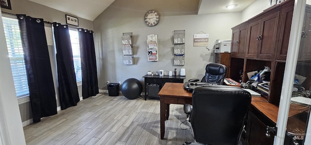 1122 N Roper Pl, Meridian, ID 83642 - office area featuring vaulted ceiling, light wood-style flooring, and baseboards