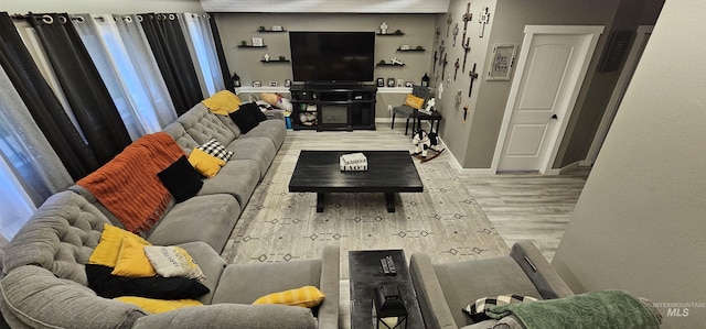 1122 N Roper Pl, Meridian, ID 83642 - living room with wood finished floors and baseboards