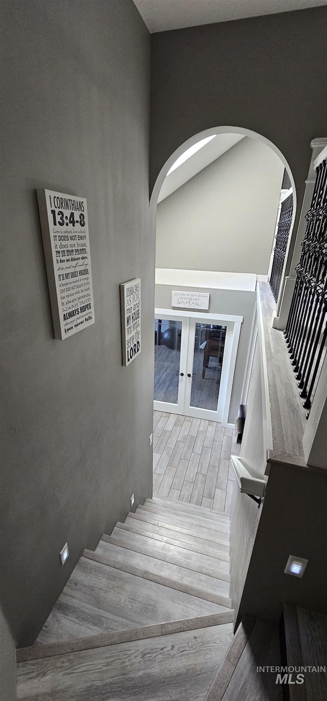 1122 N Roper Pl, Meridian, ID 83642 - stairs featuring arched walkways and wood finished floors
