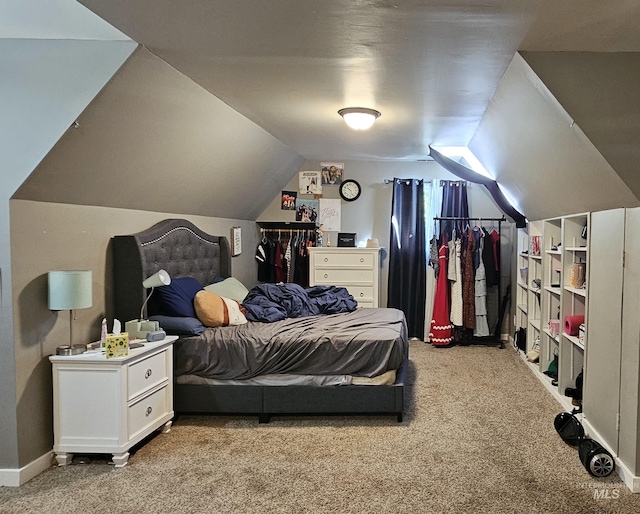 1122 N Roper Pl, Meridian, ID 83642 - bedroom with carpet flooring, vaulted ceiling, and baseboards