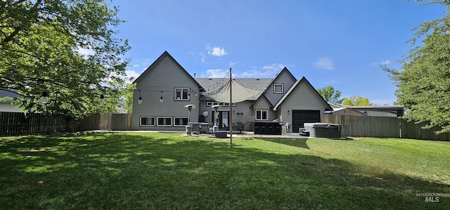 1122 N Roper Pl, Meridian, ID 83642 - back of house with a hot tub, a garage, and a patio area