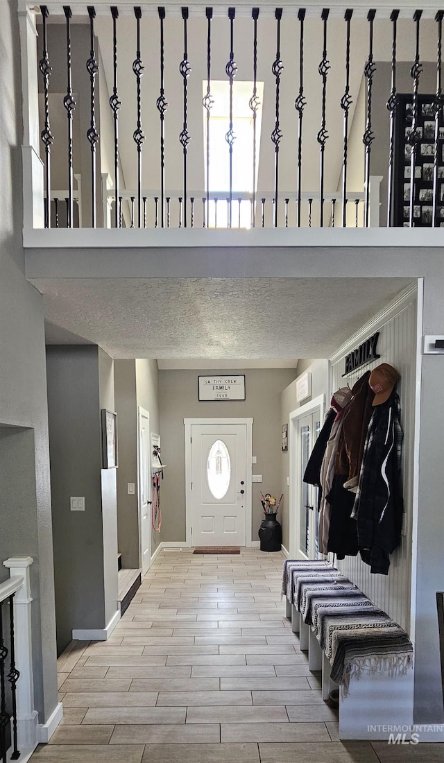 1122 N Roper Pl, Meridian, ID 83642 - foyer with wood finished floors and baseboards