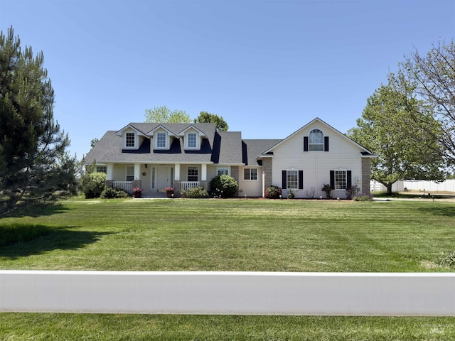 2361 N Pollard Ln, Star, ID 83669 - new england style home featuring a porch and a front yard