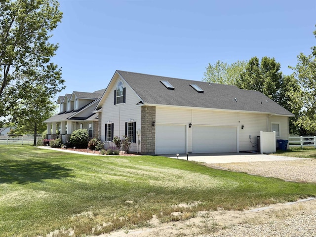 2361 N Pollard Ln, Star, ID 83669 - view of side of home with driveway, a garage, roof with shingles, and stone siding