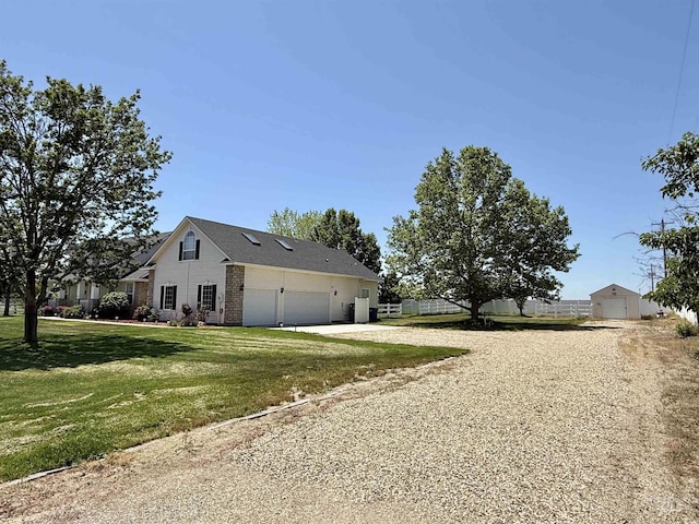2361 N Pollard Ln, Star, ID 83669 - view of home's exterior with gravel driveway and brick siding
