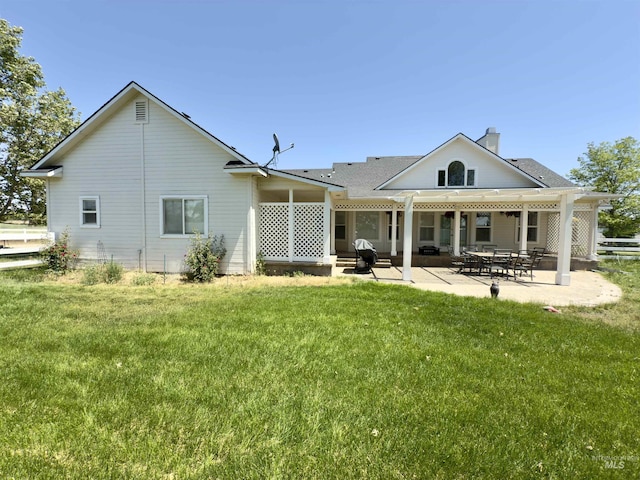 2361 N Pollard Ln, Star, ID 83669 - back of house featuring a yard, a chimney, a patio, and a pergola