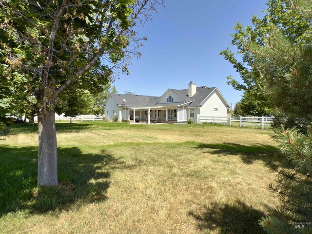 2361 N Pollard Ln, Star, ID 83669 - view of front of house featuring a chimney