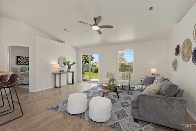 1045 S Arrowrock Ave, Middleton, ID 83644 - living room featuring ceiling fan, vaulted ceiling, and wood finished floors