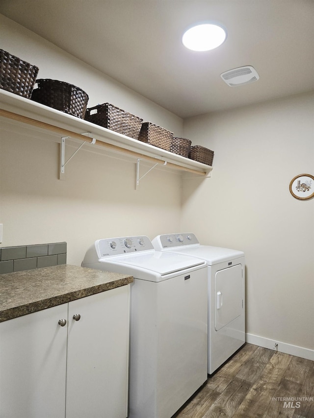 2716 Dogwood Ave, Fruitland, ID 83619 - washroom featuring dark wood finished floors, separate washer and dryer, and baseboards