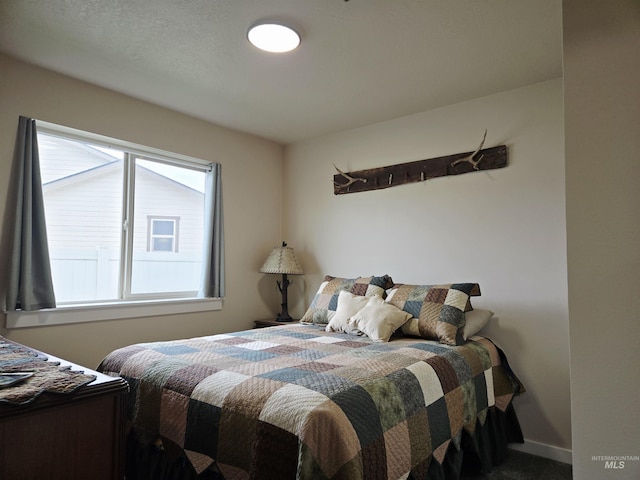2716 Dogwood Ave, Fruitland, ID 83619 - carpeted bedroom with baseboards