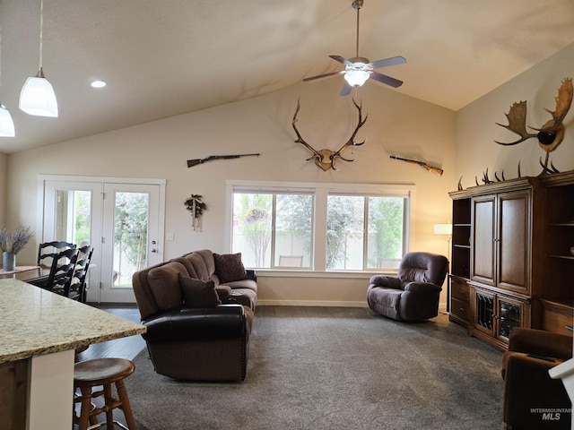 2716 Dogwood Ave, Fruitland, ID 83619 - living room with healthy amount of natural light, dark carpet, a ceiling fan, high vaulted ceiling, and recessed lighting