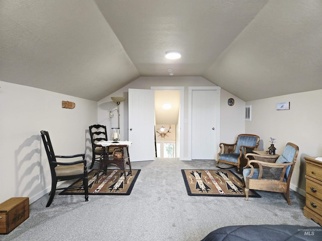 2716 Dogwood Ave, Fruitland, ID 83619 - sitting room featuring vaulted ceiling, carpet floors, and baseboards