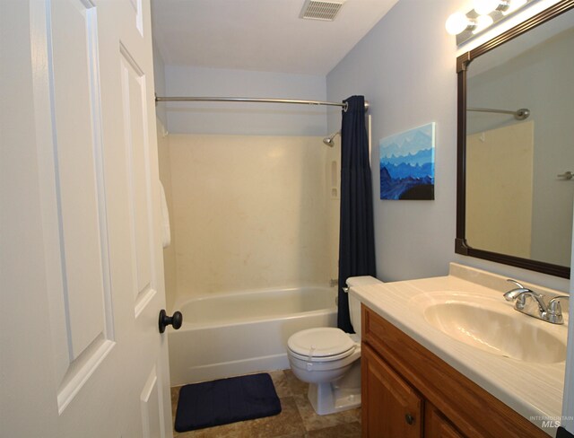 full bathroom with visible vents, vanity, toilet, and shower / tub combo