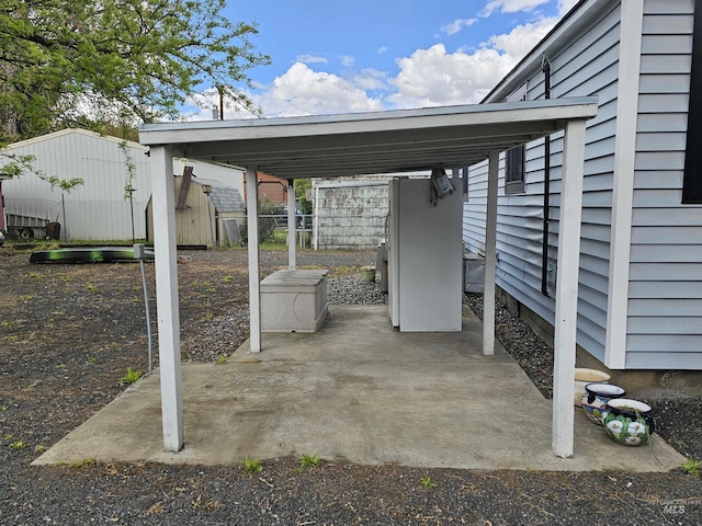 view of patio / terrace featuring a carport