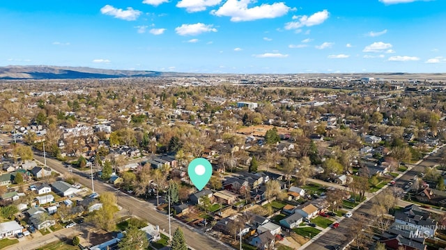 aerial view featuring a mountain view and a residential view