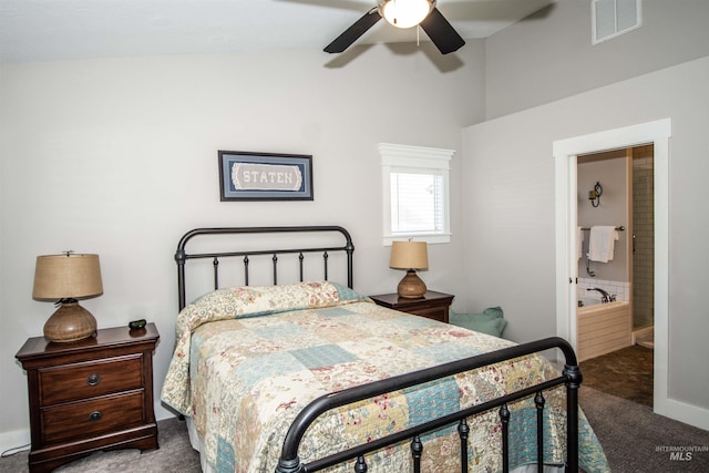 bedroom featuring connected bathroom, carpet flooring, and ceiling fan