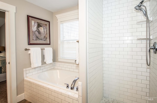 bathroom featuring plus walk in shower