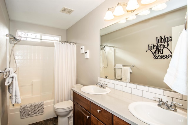 full bathroom featuring toilet, shower / tub combo, tasteful backsplash, and vanity