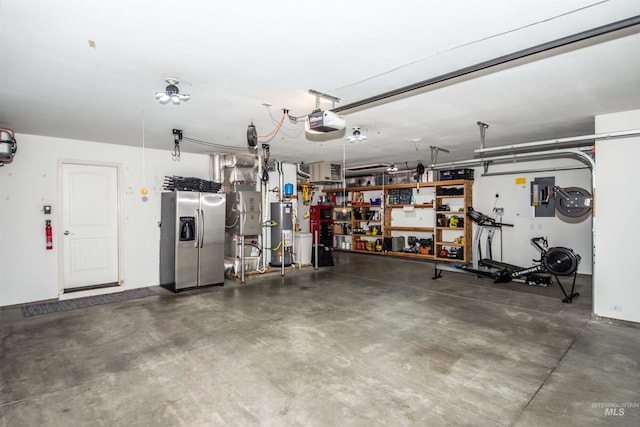 garage featuring stainless steel fridge with ice dispenser, water heater, and a garage door opener