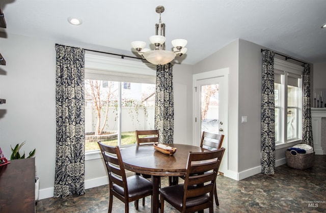 dining area featuring a chandelier