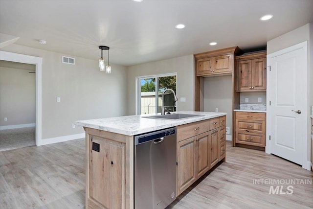 kitchen featuring a sink, light wood-style flooring, visible vents, and dishwasher