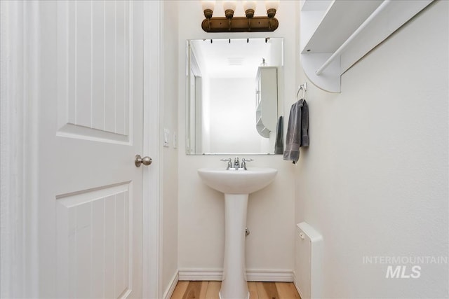 bathroom with wood finished floors