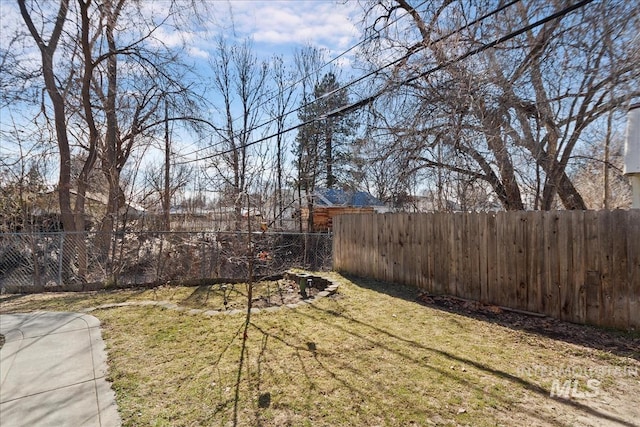 view of yard with fence