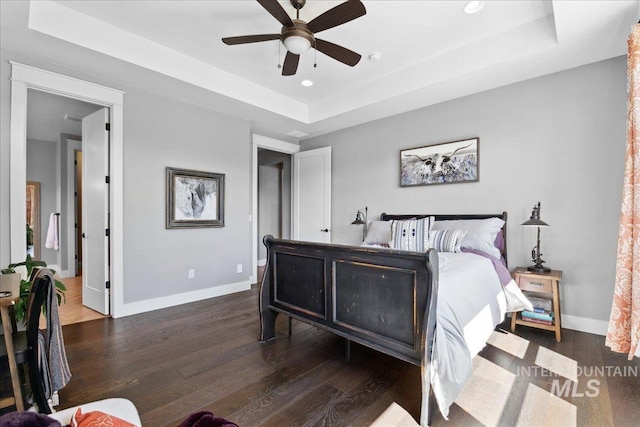 92 S Wildgrass Way, Star, ID 83669 - bedroom featuring a raised ceiling, wood finished floors, baseboards, recessed lighting, and ceiling fan