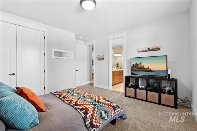 92 S Wildgrass Way, Star, ID 83669 - bedroom with carpet, baseboards, a closet, and ensuite bath