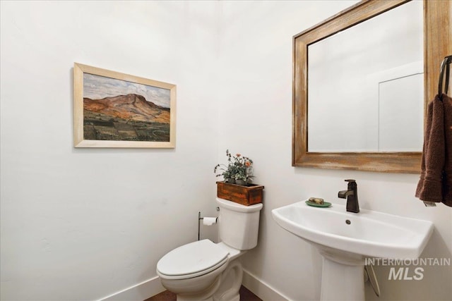 92 S Wildgrass Way, Star, ID 83669 - bathroom featuring baseboards and toilet