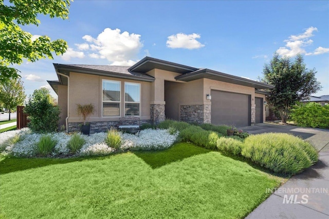 92 S Wildgrass Way, Star, ID 83669 - prairie-style home with stone siding, stucco siding, a garage, and a front yard