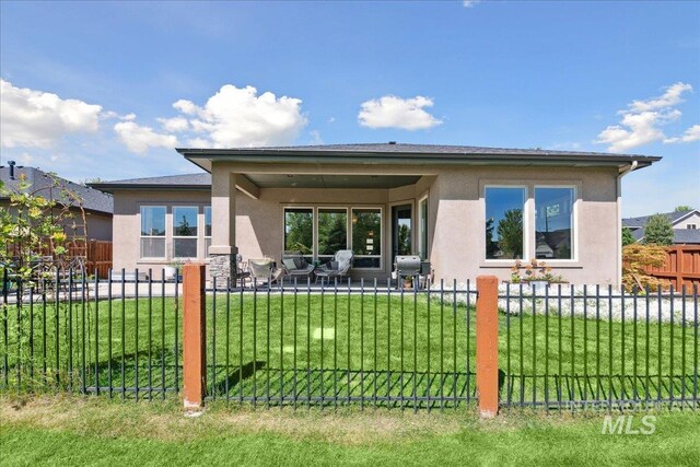 92 S Wildgrass Way, Star, ID 83669 - back of house with stucco siding