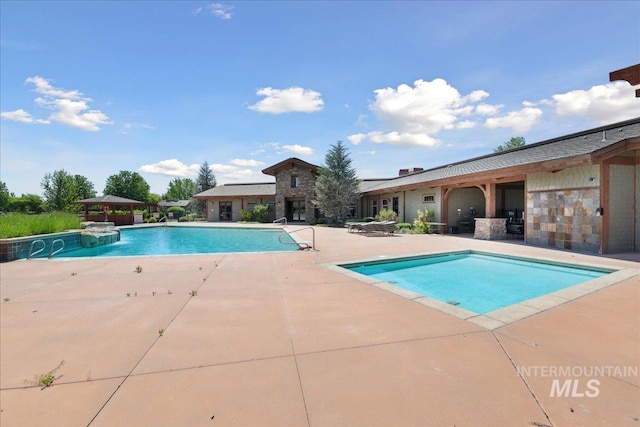 92 S Wildgrass Way, Star, ID 83669 - swimming pool featuring a patio area