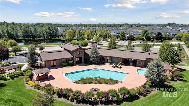 92 S Wildgrass Way, Star, ID 83669 - community pool with a residential view, a patio, and a water view