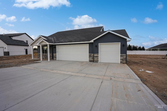 ranch-style home with a garage