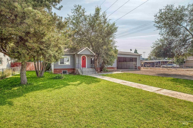 view of front facade with a front lawn and a garage