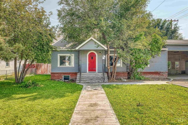 view of front of house with a front lawn