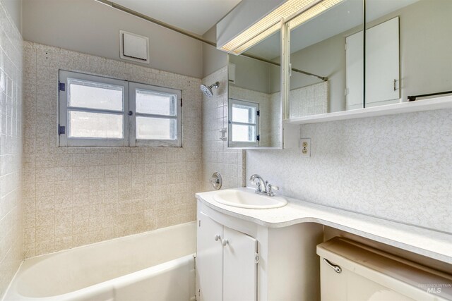 kitchen featuring french doors, sink, and light hardwood / wood-style floors