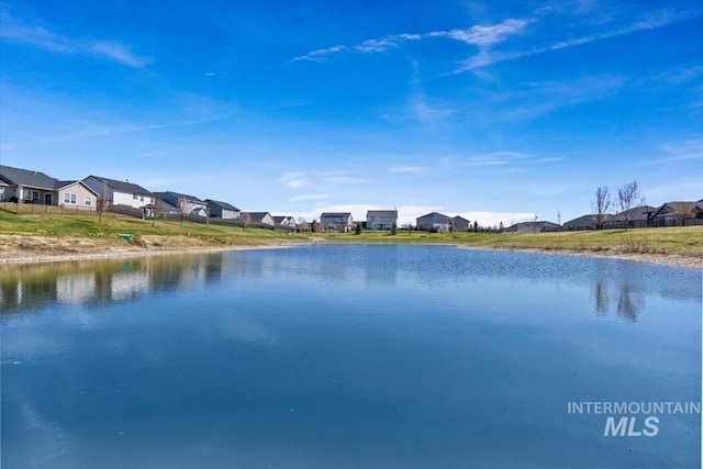 property view of water with a residential view